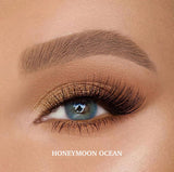 Honeymoon Ocean colored contact lenses with a rich deep blue-green hue for a natural enhancement