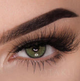 Best green contact lenses for dark eyes, offering high opacity with a rich emerald tone. Similiar to natural quartzo