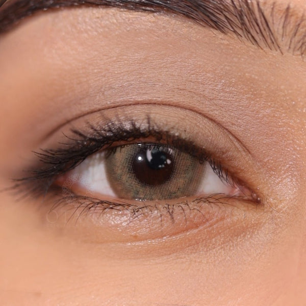 High-opacity hazel-grey lenses designed for full coverage on dark eyes.