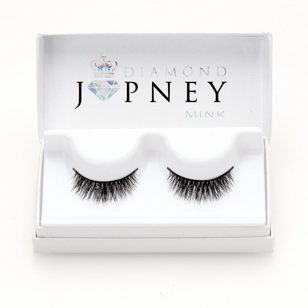 Irresistible Faux Mink Lashes with a wispy, cat-eye effect and fluffy winged ends.