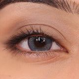 Limbal ring blue contact lenses for a bold, defined eye look.