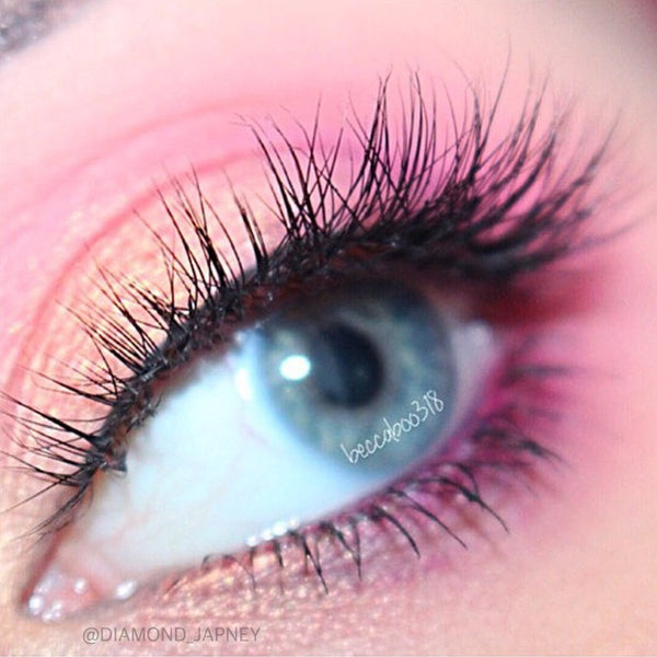 Close-up of Medusa Mink Lashes on dark eyes, showcasing their fluttery volume