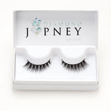 Mesmerized Mink Lashes with a wispy, cat-eye effect and longer ends for eye elongation.