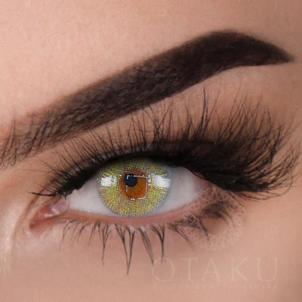 Otaku Sultry Siren gold glitter contact lenses for dark eyes, featuring a blue-grey-green blend with high opacity.